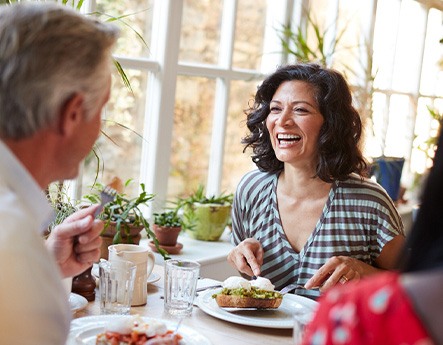 People converse over brunch
