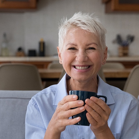 Woman smiling on a couch
