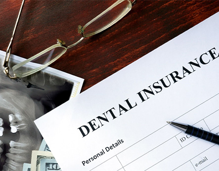 dental insurance form on table