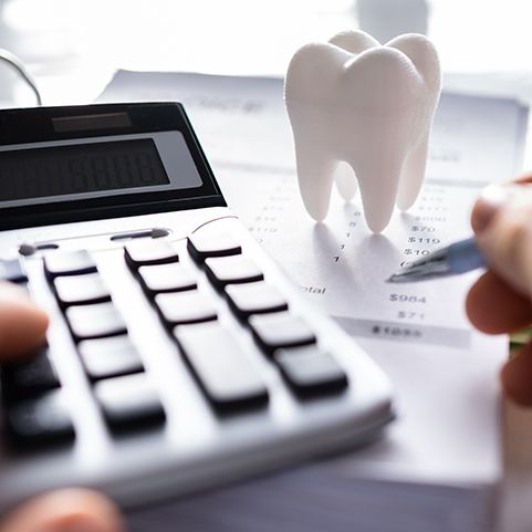 Dentures patient in Lewisville budgeting for dentures