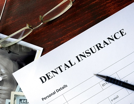 dental insurance form on table