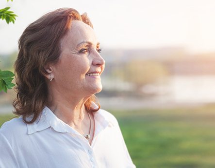 woman smiling outside 