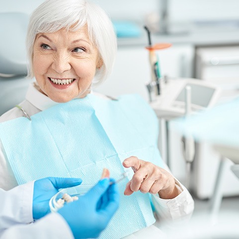 a patient speaking with their dentist 