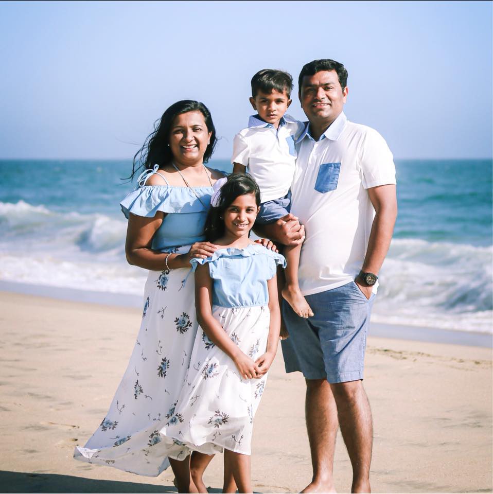 Doctor Jayswal and her family on the beach