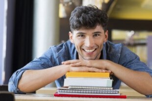 Man with healthy smile after orthodontic treatment