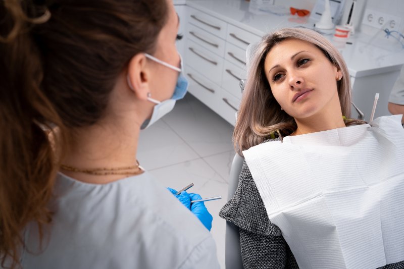 a patient undergoing an emergency dental visit in Lewisville