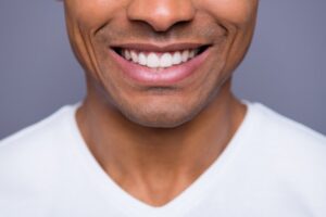 Close-up of a man’s smile